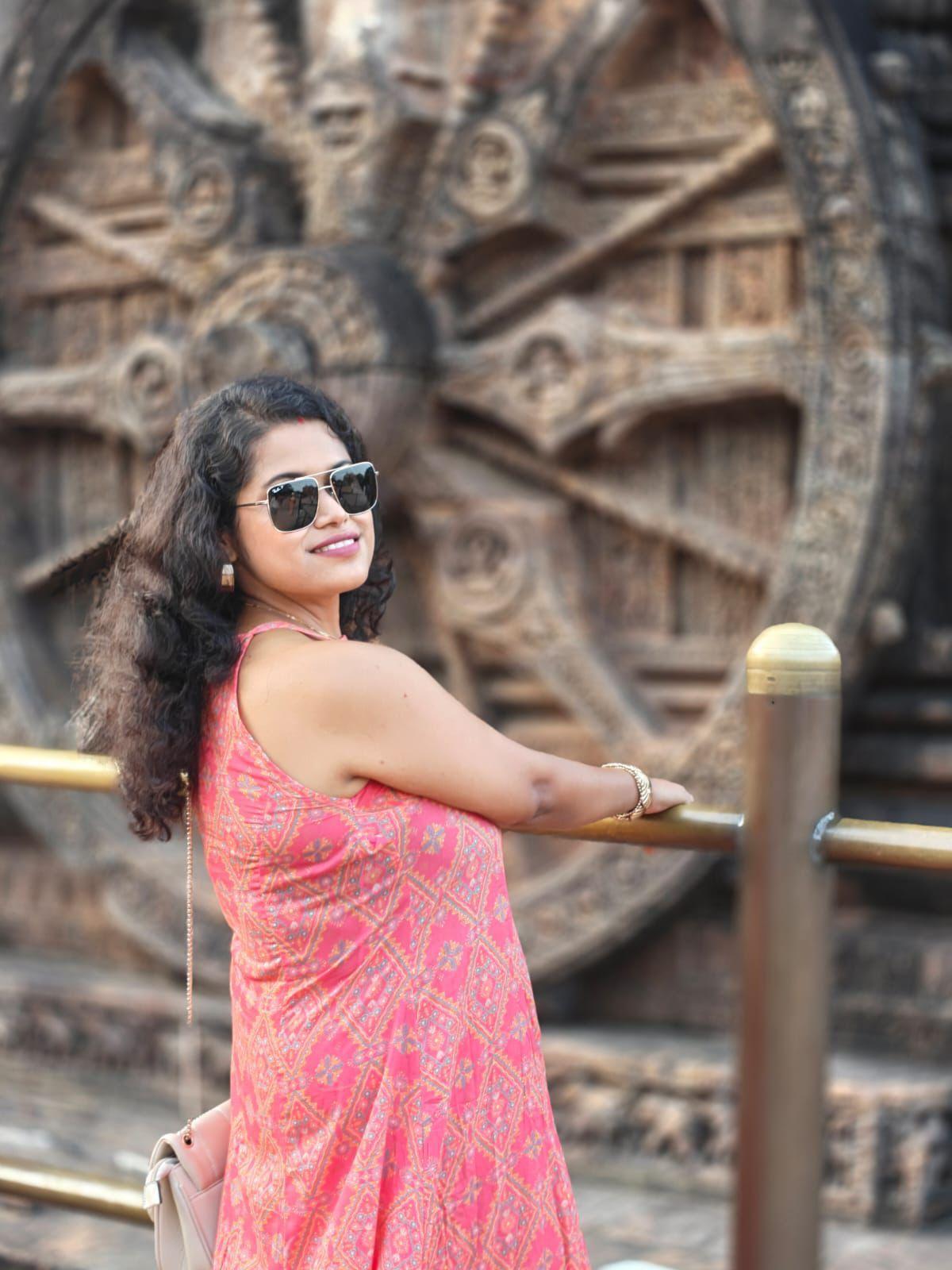 Woman outdoors featured in a client testimonial sharing her first-time international investment experience in U.S. real estate